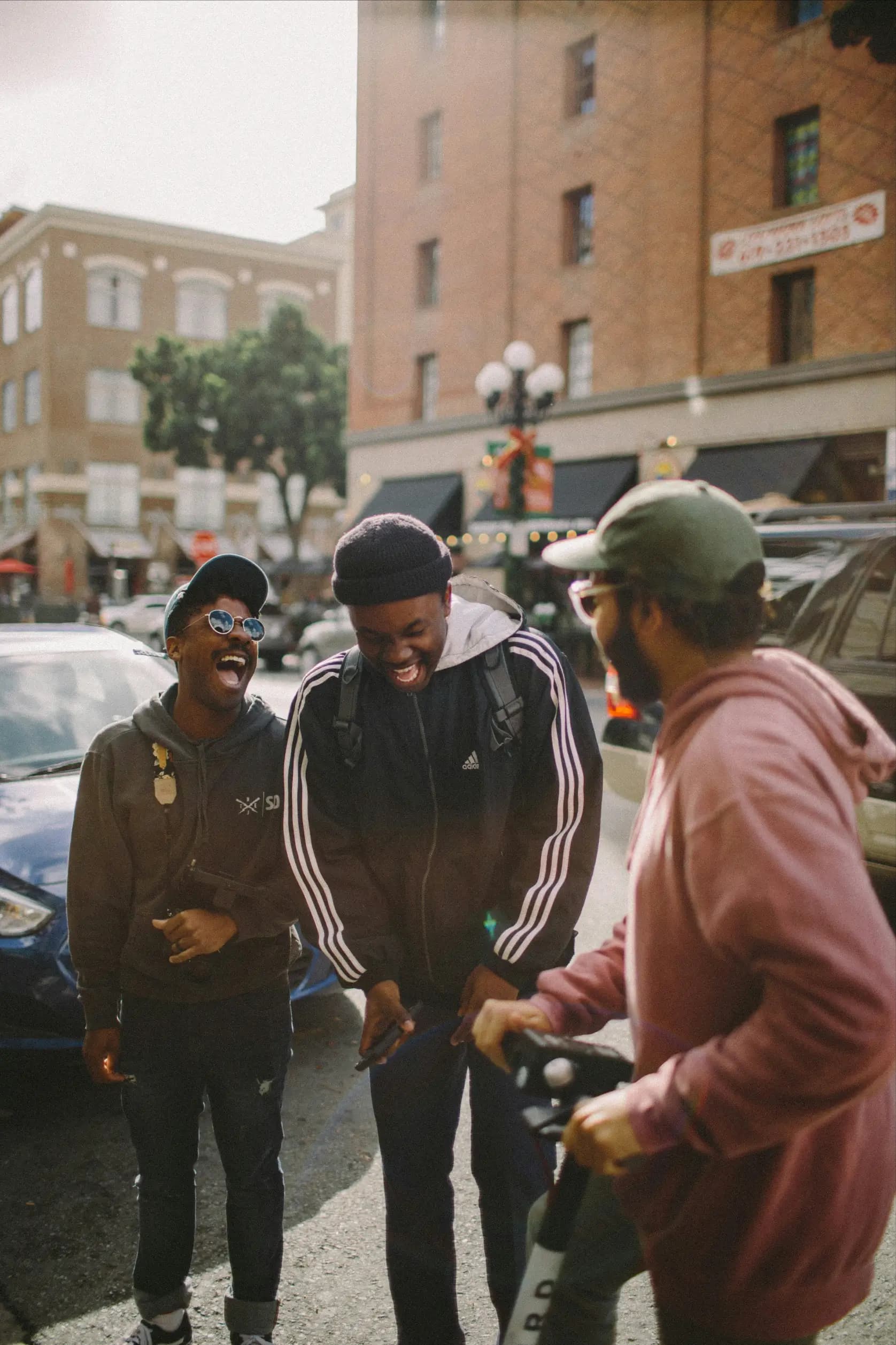 Attendees laughing between sessions at a community event